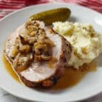 Romanian Roasted Pork Leg Joint with Garlic, Paprika, and Herbs Recipe