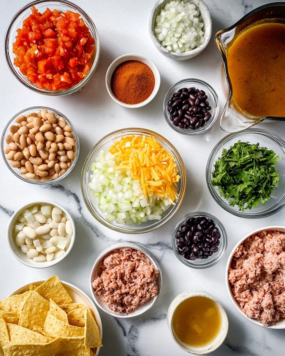 The image shows many clear and white bowls arranged on a white marbled surface, each containing different ingredients. There is one bowl with chopped white onions, another with chopped green peppers, one with shredded cheese, and one with chopped fresh green herbs. Several smaller clear bowls hold various red and brown spices. There are also bowls with pinto beans, white beans, salsa, tomato paste, and raw ground meat. A clear measuring cup with light brown broth and another small bowl with a white liquid are also visible. A bowl holds light-colored tortilla chips. The ingredients are spread out neatly, showing varied colors and textures. photo taken with an iphone --ar 4:5 --v 7