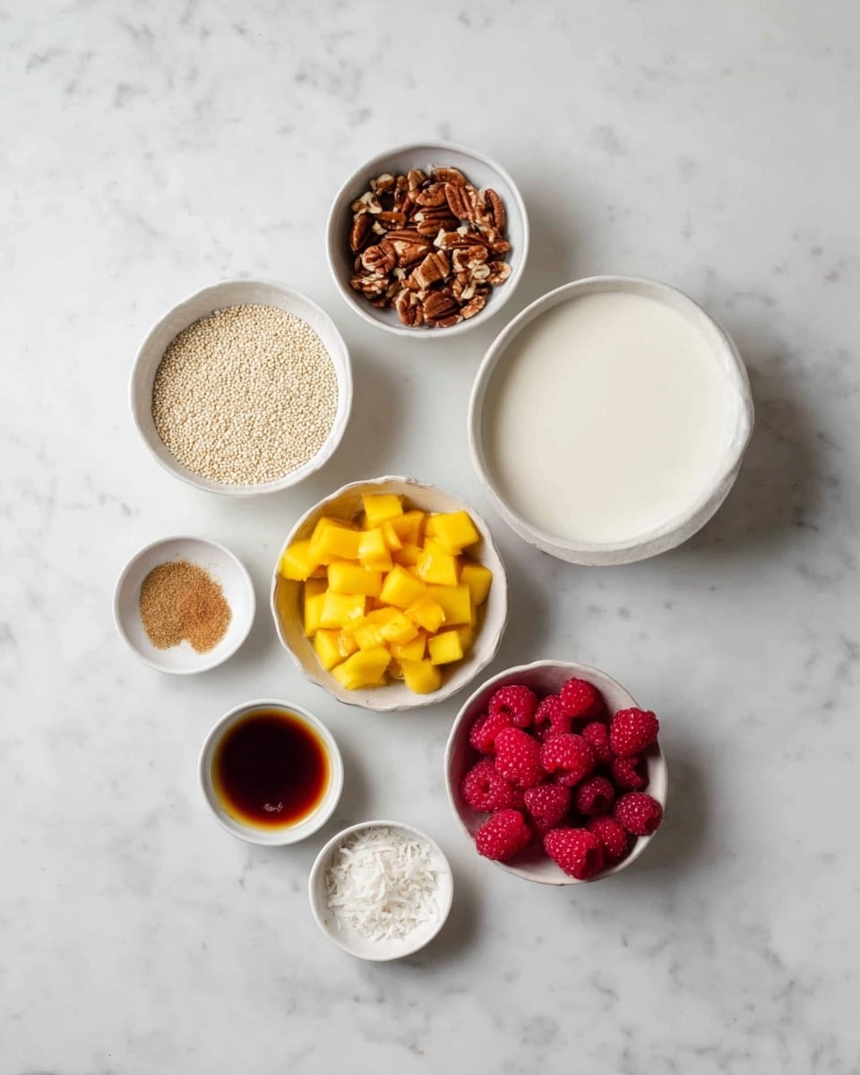 The image shows seven small white bowls arranged on a white marbled surface. The largest bowl at the top right contains a smooth, thick white liquid. To its left, a bowl with small light beige grains, likely quinoa. Below that, a bowl filled with bright yellow diced mango pieces. To the right of the mango is a bowl of chopped brown nuts, possibly pecans. Near the bottom center, a bowl holds bright red raspberries. To the left of the raspberries, a small bowl holds a dark brown liquid, possibly vanilla extract. Above that, another small bowl contains light brown powder, likely cinnamon. The last bowl at the bottom left holds thin, white flakes, which could be coconut. The whole setup is neat and clean. photo taken with an iphone --ar 4:5 --v 7