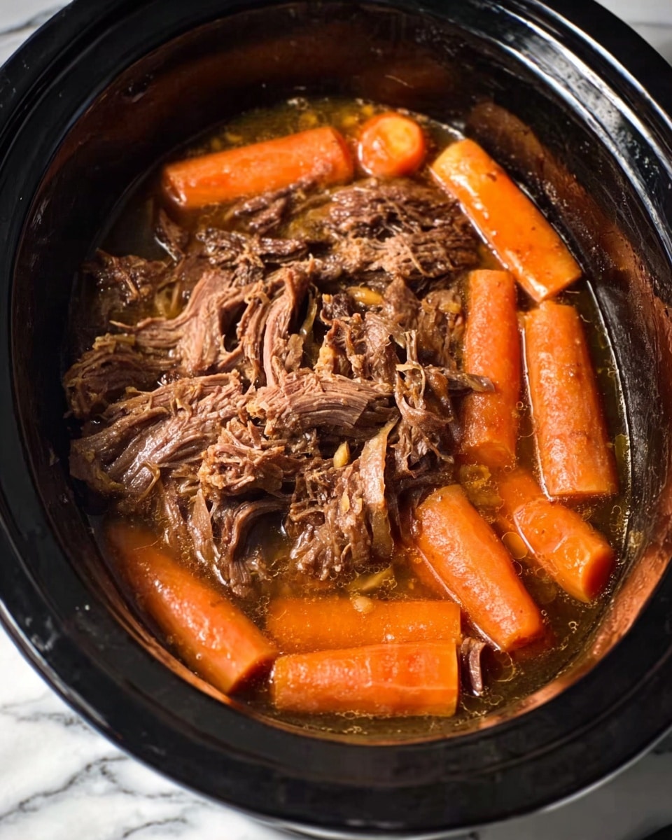 The image shows a slow cooker filled with layers of cooked meat and carrots. The first layer is shredded brown meat, appearing soft and juicy, placed around the edges and center. On top and around the meat, there are whole baby carrots, bright orange and slightly shiny from cooking. The meat and carrots sit in a light brown broth that fills the bottom of the slow cooker. The inside of the slow cooker is black, and the entire pot is set on a white marbled surface. Photo taken with an iphone --ar 4:5 --v 7