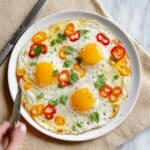 Sunny-Side-Up Breakfast Pizza with Veggies and Melted Mozzarella Recipe