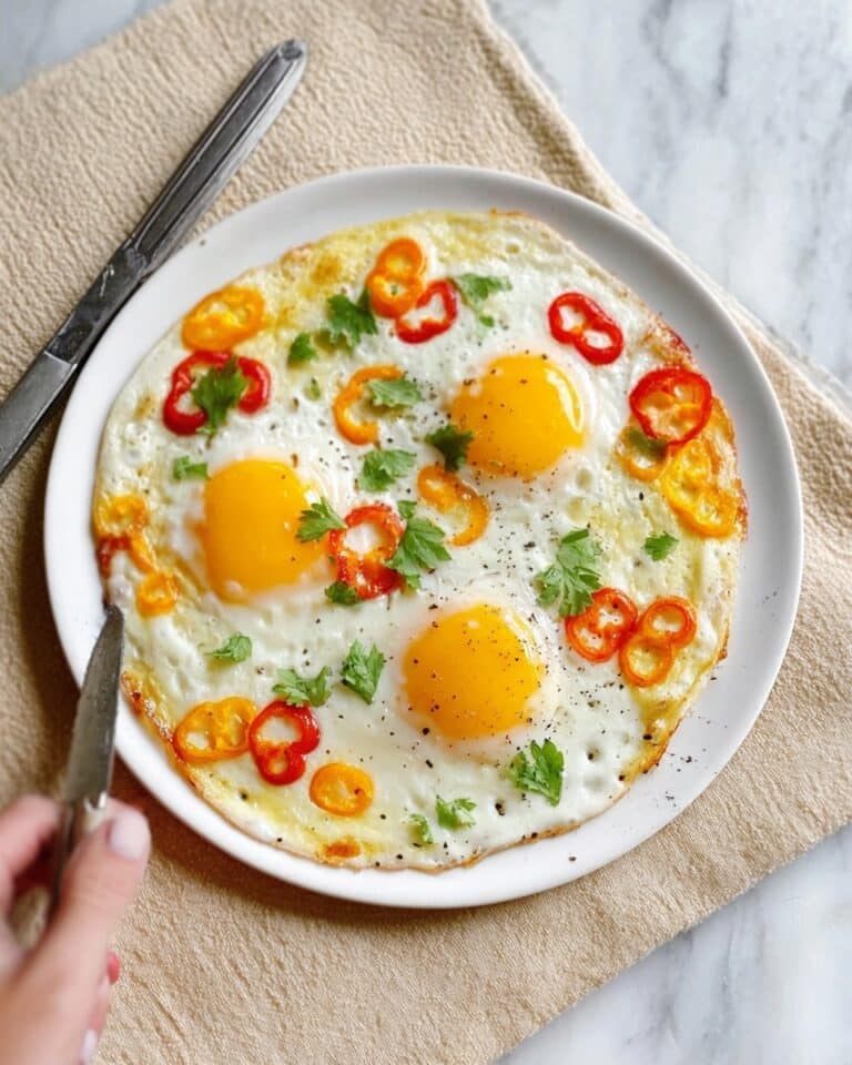 Sunny-Side-Up Breakfast Pizza with Veggies and Melted Mozzarella Recipe