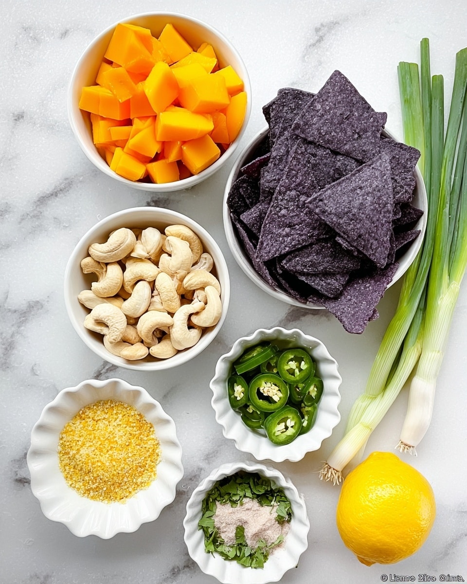 The image shows a white bowl filled with dark purple tortilla chips placed near the top right, next to a bunch of three green onions with long green stalks and white bulbs lying on a white marbled surface. To the left is another white bowl full of bright orange frozen mango pieces. Below them, in a round white bowl, are light beige cashew nuts, sitting beside a small white bowl with yellow nutritional yeast flakes. There is also a small white bowl with sliced green jalapeño peppers and one with chopped green herbs. A small white scalloped dish holds a beige powder, and half a lemon with bright yellow skin and juicy interior lies in front of the bowls. The photo taken with an iphone --ar 4:5 --v 7