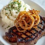 Steak with Caramelized Onions and Herb Mashed Potatoes Recipe