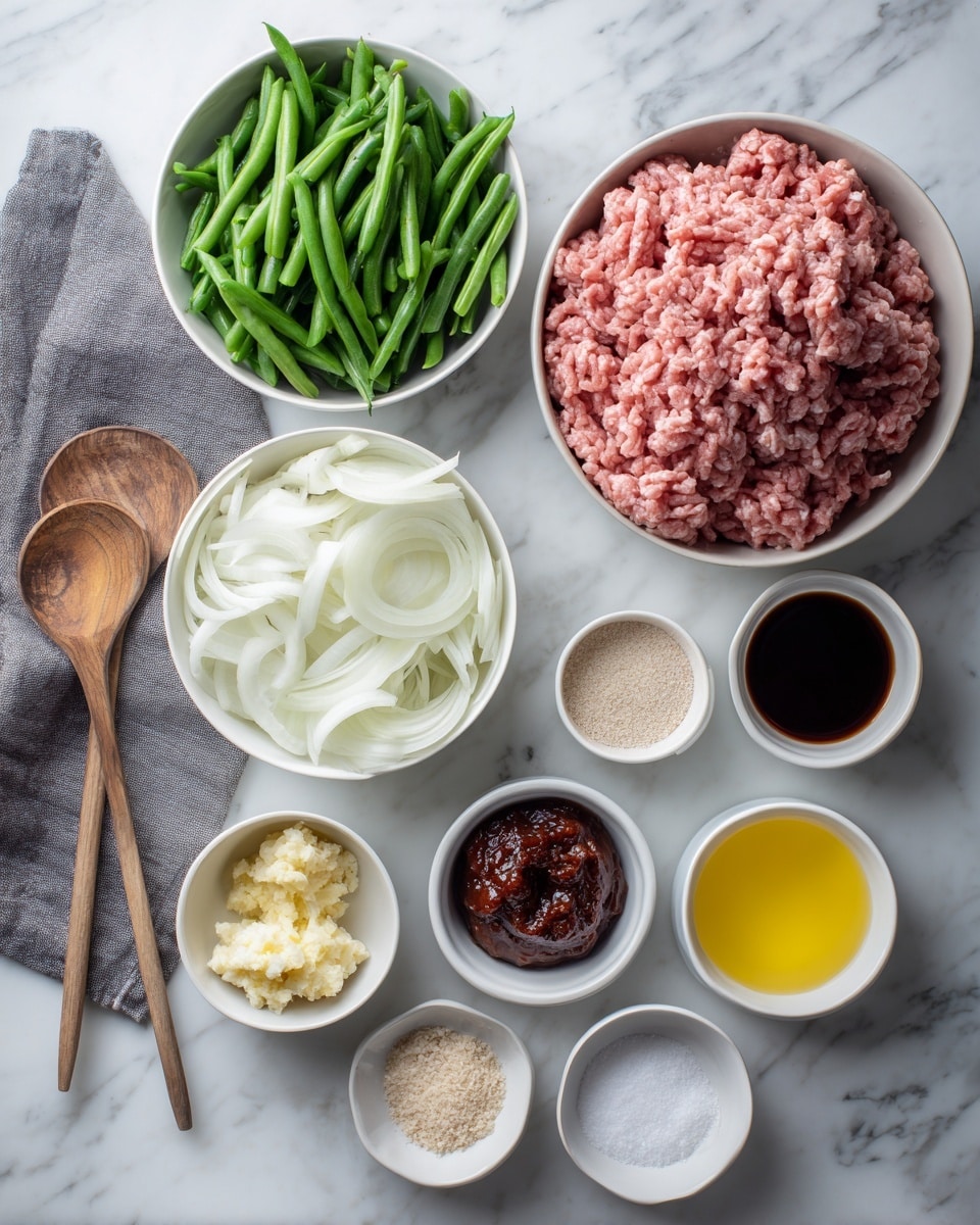 The image shows a collection of white bowls and small dishes arranged on a white marbled surface. Starting from the top right, there is a large white bowl filled with raw ground pink meat with fine texture. To the left, another large white bowl holds many frozen green beans, laying in various directions. Below the meat, there is a medium white bowl filled with sliced white onion layers. Next to it are two small white dishes containing minced pale yellow garlic and a thick, dark reddish-brown paste. Along the bottom row, from left to right, there is a small white dish of pale beige powder, a small white dish of light tan granules, a bowl of bright yellow liquid, a bowl of dark soy sauce, and three other small white dishes with white salt, white coarse salt, and a white powdered ingredient. A wooden spoon rests on a gray cloth napkin on the left side. Photo taken with an iphone --ar 4:5 --v 7
