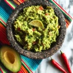 Creamy Homemade Guacamole with Lime and Fresh Herbs Recipe