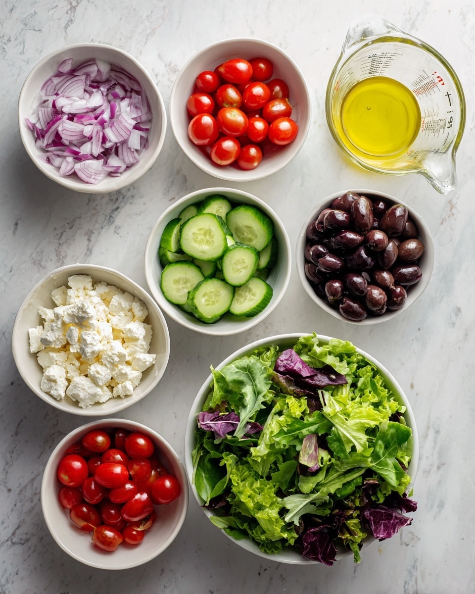 The image shows seven small white bowls arranged on a white marbled surface. One bowl contains fresh mixed green salad leaves with some purple leaves mixed in at the bottom right. Another bowl has chopped red onions, while a third has halved cherry tomatoes. A fourth bowl holds sliced cucumbers, and a fifth contains crumbly white cheese. Black olives are shown in another small bowl, and a transparent measuring cup with a yellow olive oil dressing or sauce is at the top right. The arrangement is neat and colorful with fresh ingredients clearly visible. Photo taken with an iphone --ar 4:5 --v 7