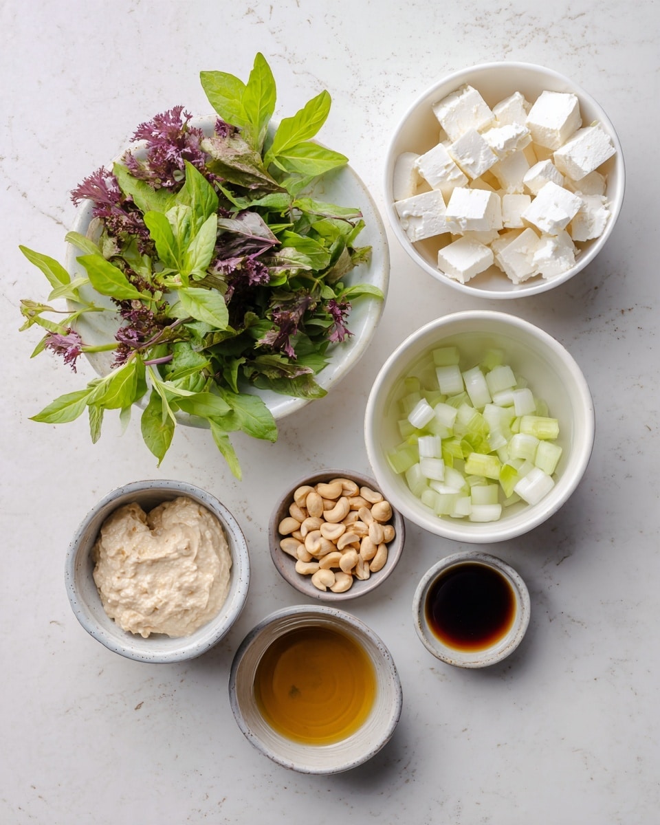 The image shows six white bowls with different ingredients on a white marbled surface. The largest bowl is filled with small white cheese cubes sitting in water and placed at the top right. Below it, a medium white bowl holds pale green diced vegetables in water. To the left, a white bowl contains fresh green leafy herbs, some with purple leaves mixed in. Above this, a tiny bowl holds round beige nuts. Next to the nuts, another small bowl contains dark golden brown liquid. Finally, near the bottom left, a small bowl has a light beige pasty mixture. Everything is arranged neatly with soft natural light, photo taken with an iphone --ar 4:5 --v 7
