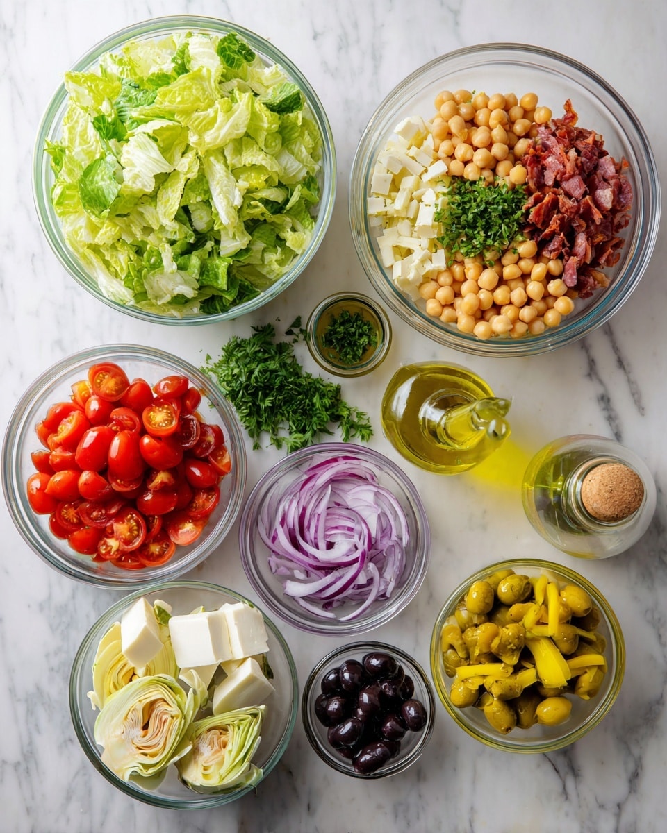 The image shows several clear glass bowls arranged on a white marbled surface. One large bowl contains chopped lettuce, shredded cured meat, and fresh parsley on the left side. A medium bowl on the right has chickpeas topped with small green herb leaves. Another medium bowl contains a mix of cubed cheese, thin sliced cured meat, and yellow peppers. Three smaller bowls hold halved cherry tomatoes, sliced red onions, and quartered artichokes. A small jar with whole black olives is also present. A tall glass bottle with a light green oil and a yellow spout is placed near the center. All items are bright and fresh with vivid colors, creating a clean and organized look. photo taken with an iphone --ar 4:5 --v 7