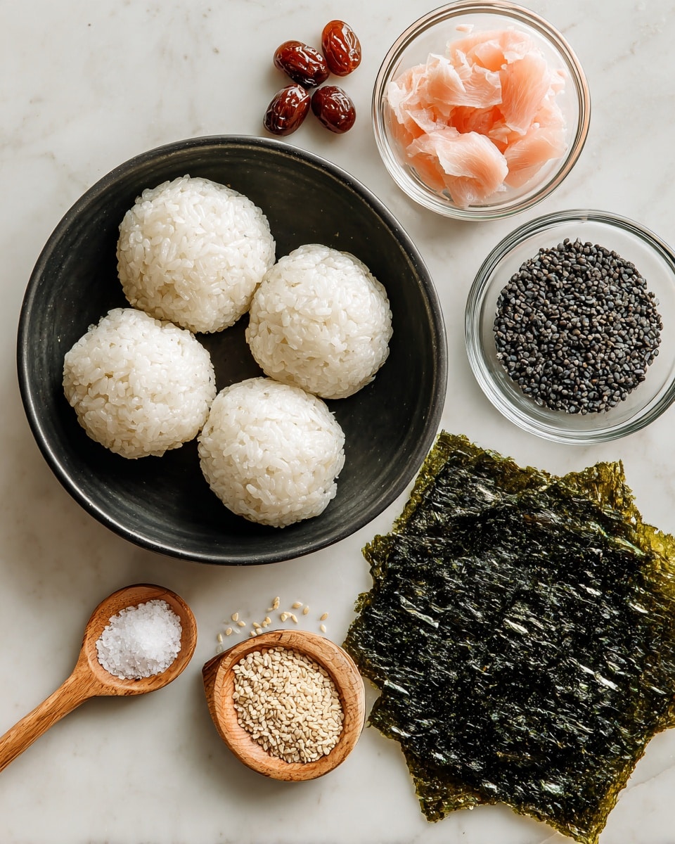 The image shows four round white rice balls tightly packed and placed in a black bowl, positioned on the left side. To the right, there is a single large dark green square seaweed sheet with a textured, shiny surface lying flat on a white marbled background. Around the bowl and sheet, there are four small clear glass bowls each holding different ingredients: one contains three reddish-brown pickled fruits, one has pale pink pieces of cooked fish, one is filled with small black sesame seeds, and the last bowl holds a small wooden spoon resting on white salt. The setup is simple and clean. photo taken with an iphone --ar 4:5 --v 7