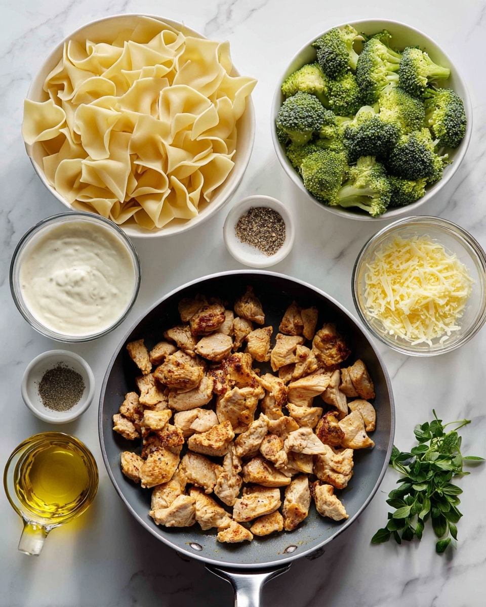 The image shows a cooking setup on a white marbled surface with several ingredients and a pan. In the pan, there are small browned pieces of cooked chicken evenly spread out, with a slightly crispy texture. Around the pan, there is a white bowl filled with raw, folded pasta pieces that have a pale cream color and soft texture. Nearby, a white bowl holds bright green steamed broccoli florets, firm and fresh. There is a glass filled with creamy white sauce, a small white bowl with grated yellow cheese, a small white bowl containing black pepper, and a small glass cup with golden olive oil. A bunch of fresh green herbs is placed next to the olive oil. The overall scene looks clean and organized, ready for meal preparation photo taken with an iphone --ar 4:5 --v 7